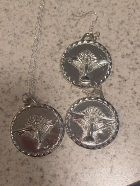 Silver Winged Figure Pendant Necklace and Earrings Set